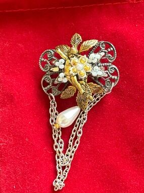 Vintage Cara Stummel Gold Tone Cupid Floral Pearl Drop Brooch with Chain Accent
